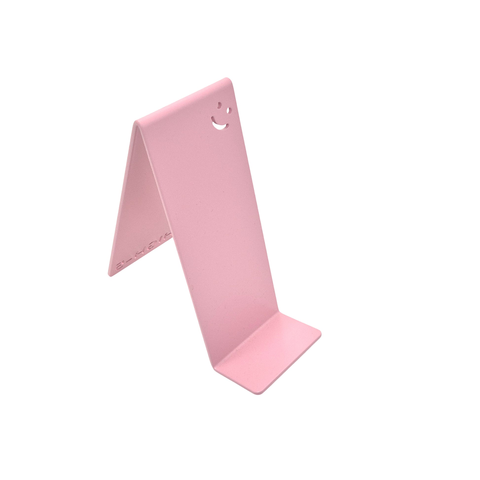 rosa Metall-Handyhalter von Highfive Engineering auf einem Schreibtisch, für ein Smartphone in aufrechter Position